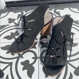 Hinge black suede lace up sandals.